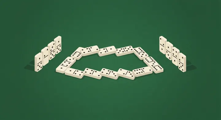 A locked line of dominoes with no legal plays left and both hands turned up for counting in Block Dominoes
