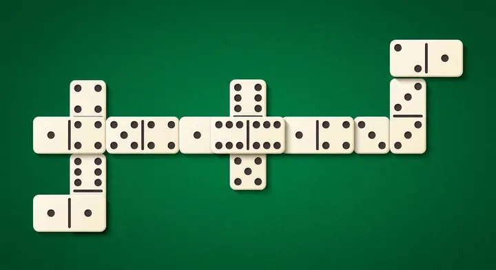 A double domino laid crosswise across the line of play in Block Dominoes